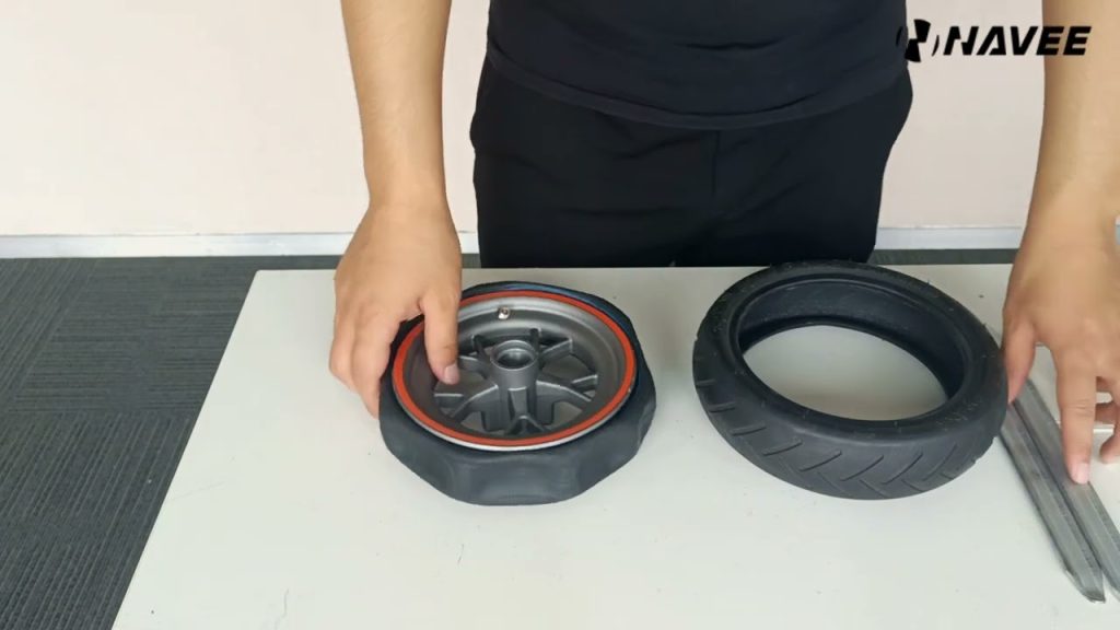 NAVEE elektromos roller kerék csere